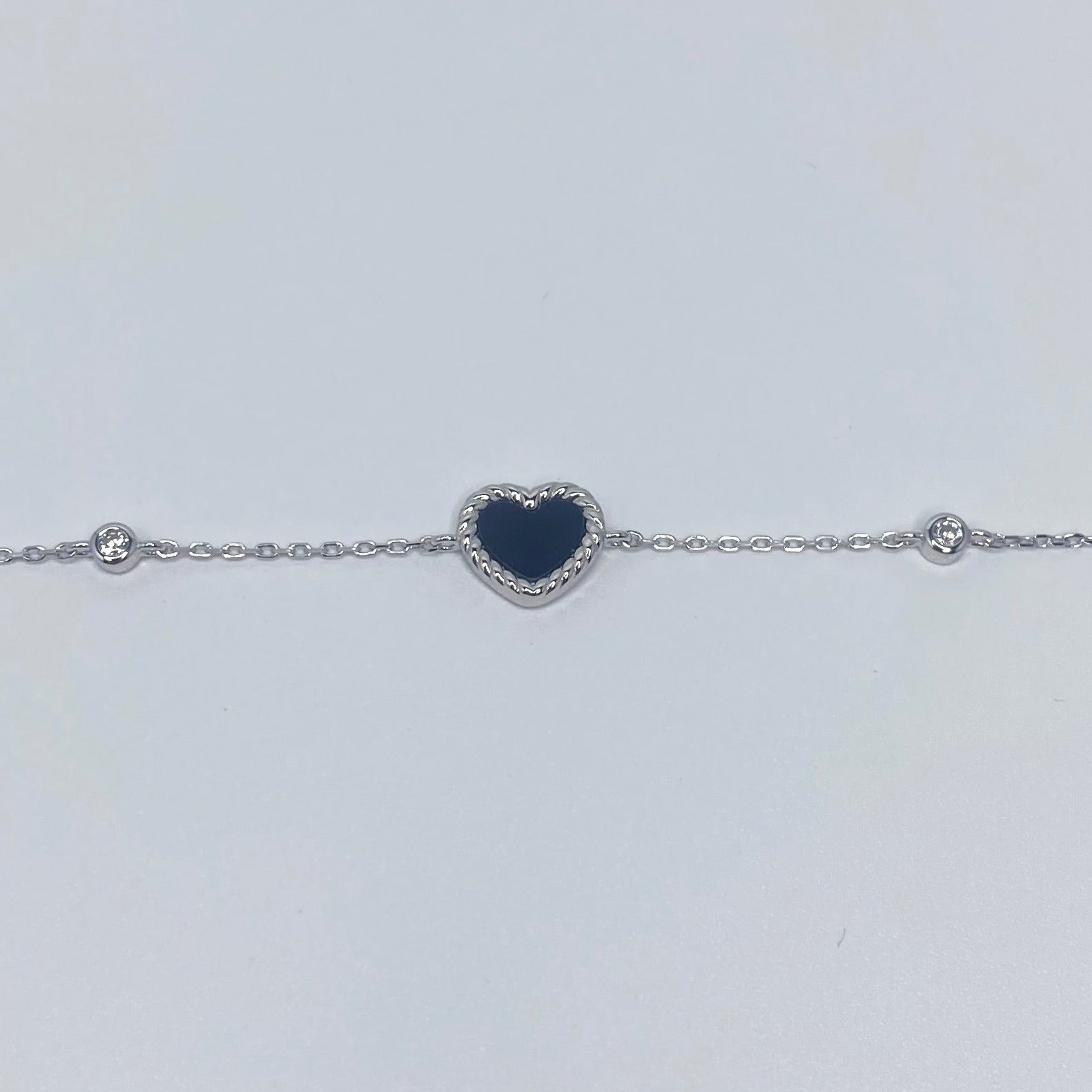 7 inches Sterling silver bracelet with black enamel heart and cubic zirconia accents extended bracelet