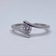 Round cut cubic zirconia ring in sterling silver tension setting