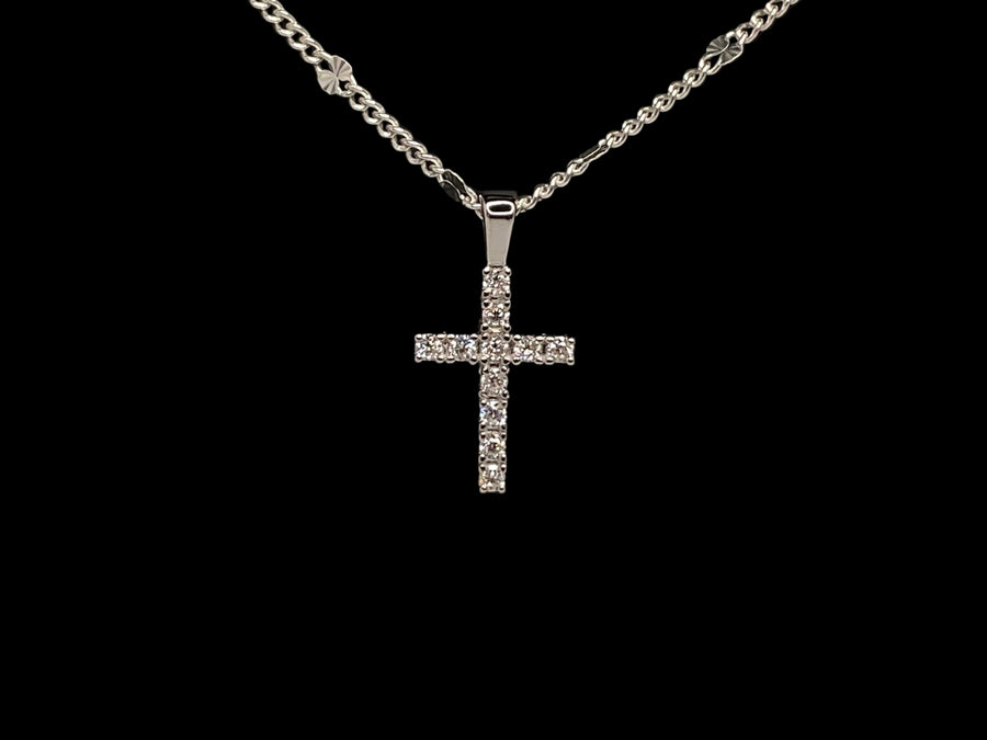 Moissanite cross pendant in a curb chain link with alternating diamond cut confetti link 